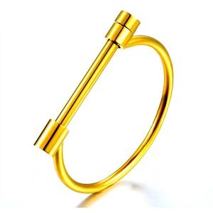 Gold Plated Stainless Steel horseshoe buckle screw cuff bracelet.